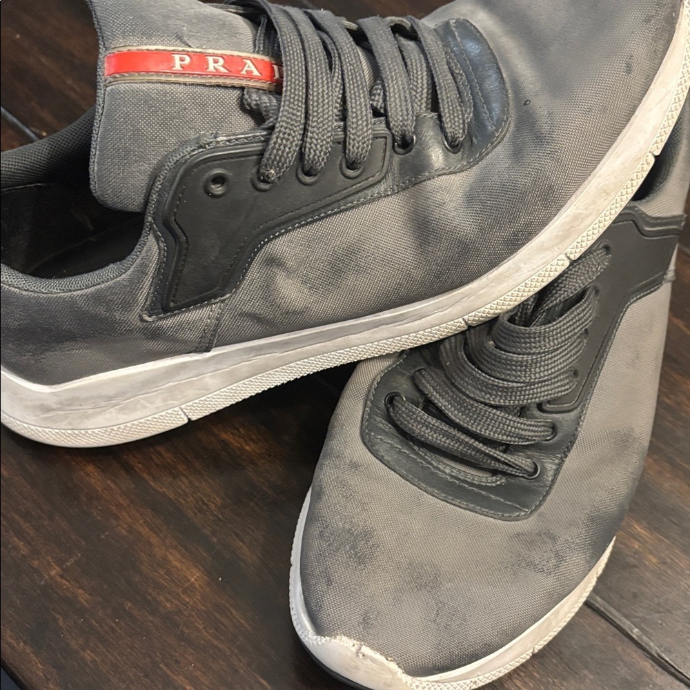 Prada Men’s Gray Canvas Sneakers with Red Logo Stripe - size 9